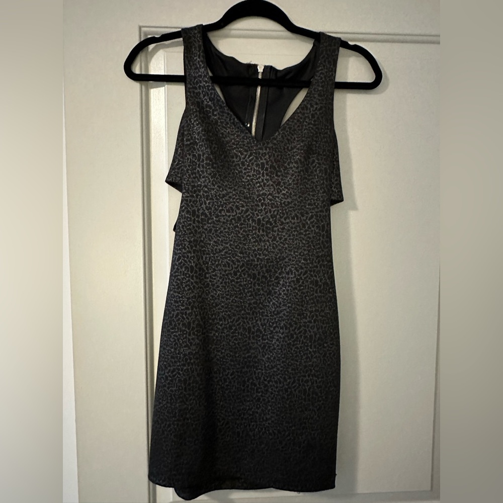 Black mini dress with cut out details on sides and back